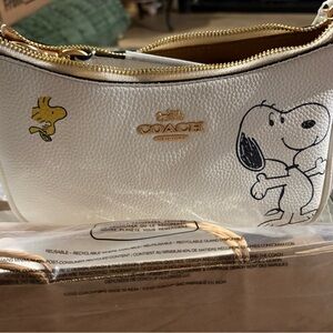 Authentic Coach White and Gold cross body bag